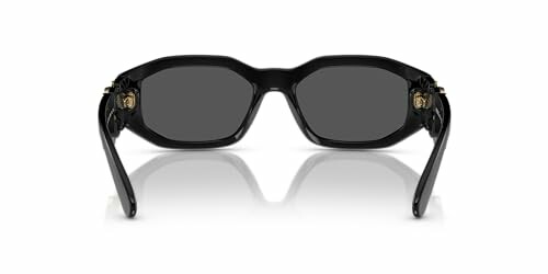 Back view of black sunglasses with dark lenses