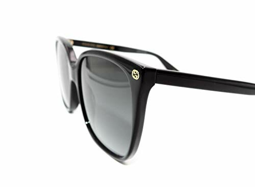 Close-up of black sunglasses with dark lenses