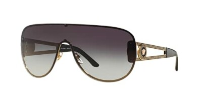 Black aviator sunglasses with gold accents and gradient lenses.