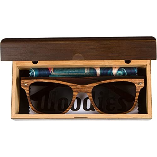 Wooden sunglasses in a wooden box with a cleaning cloth.